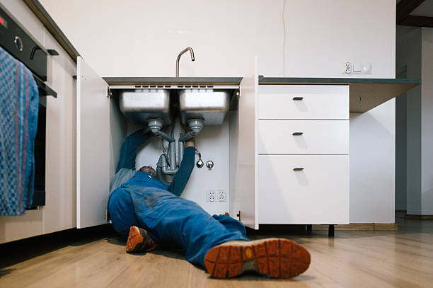 Professional Emergency Plumber technician working in Churubusco, IN